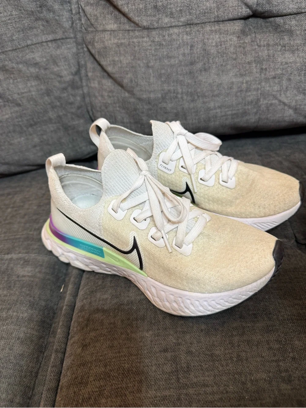 Nike Women’s White Running Sneakers with Iridescent Green-Purple Accent